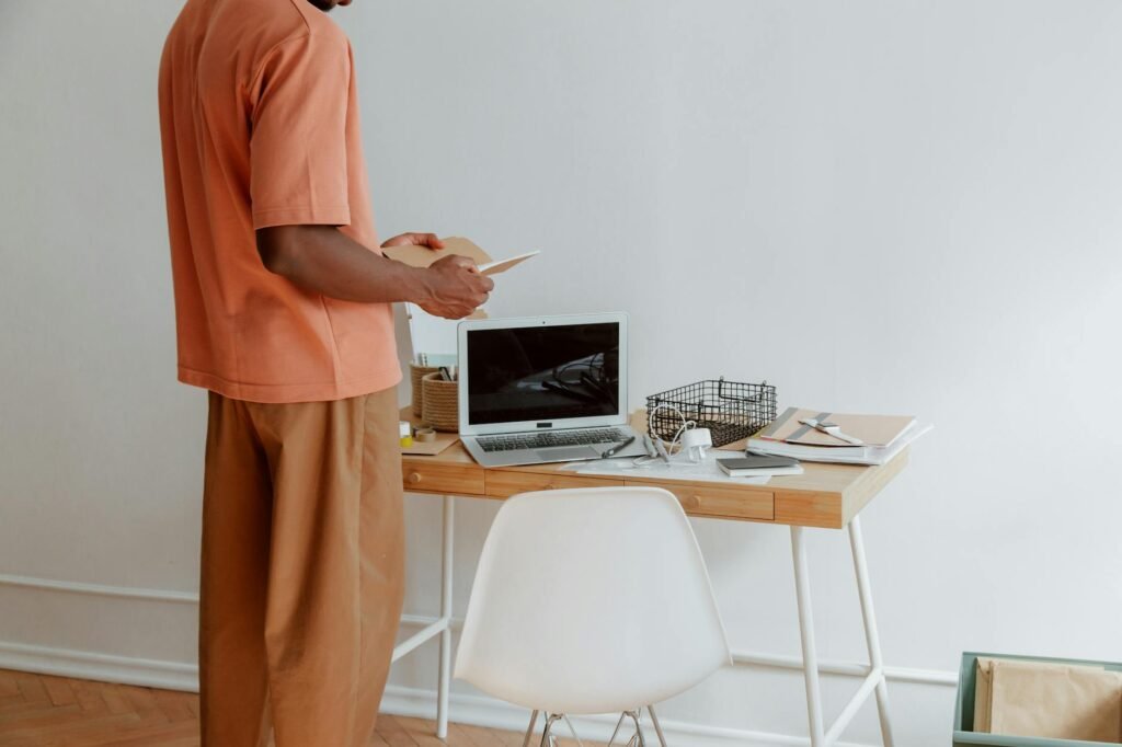 A laptop on a tidy home-office desk