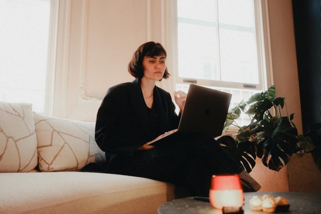 Working from home at a laptop
